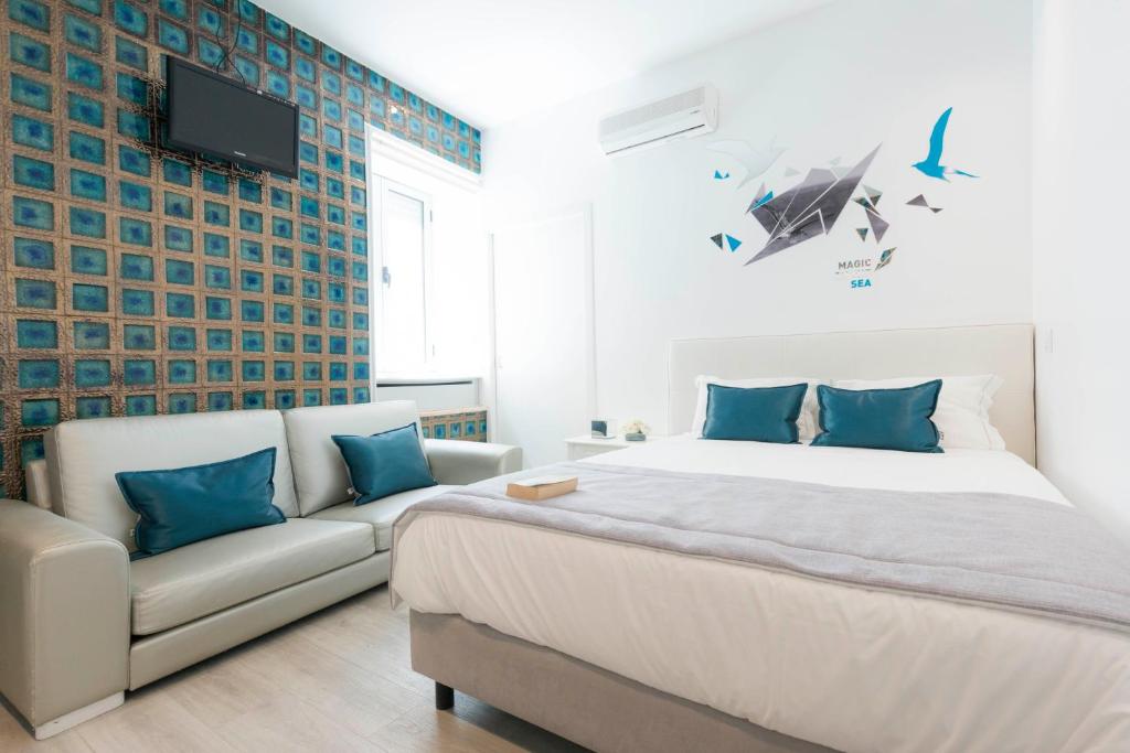 Postel nebo postele na pokoji v ubytování Hotel Magic