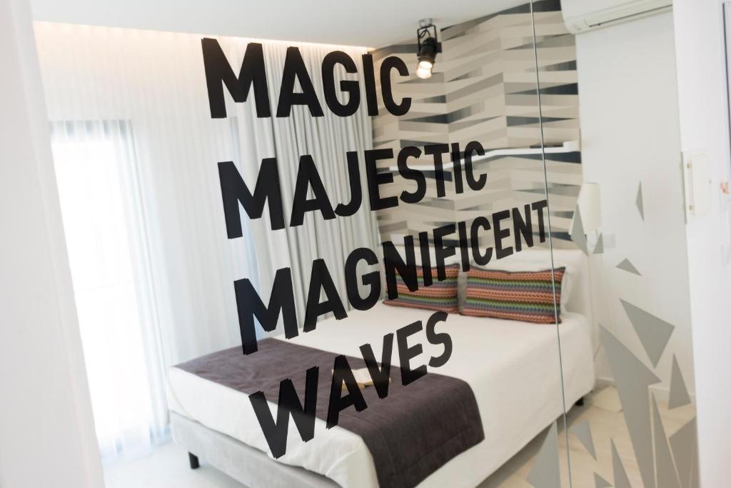 Postel nebo postele na pokoji v ubytování Hotel Magic