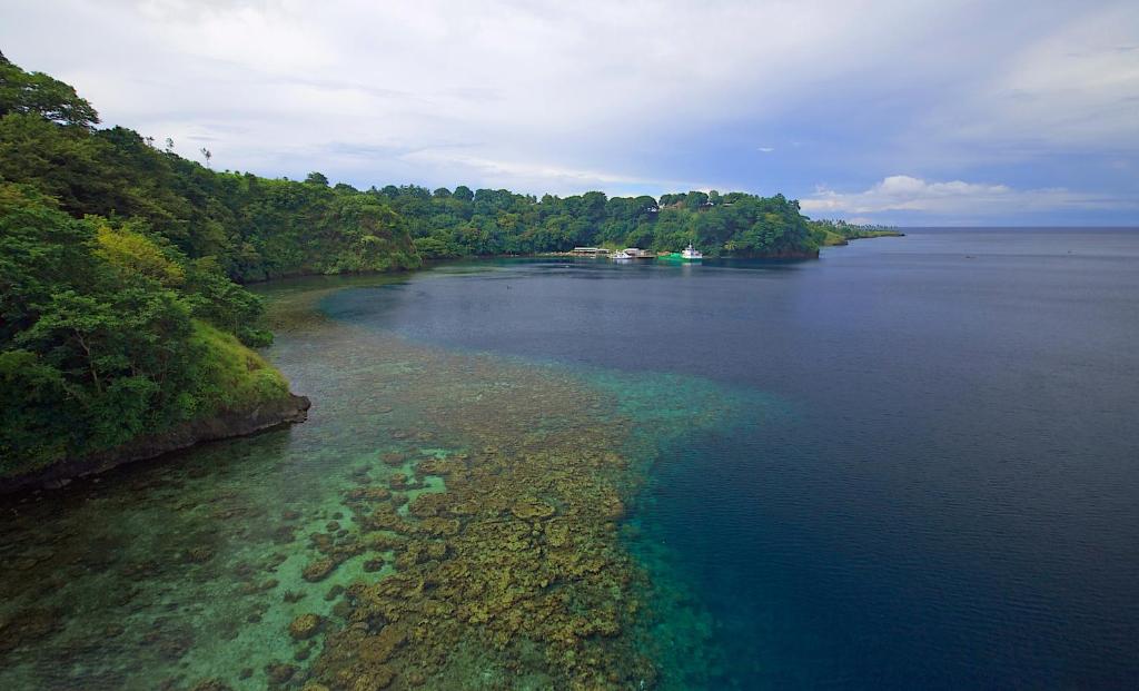 an aerial view of a large body of water at Tufi Resort in Tufi
