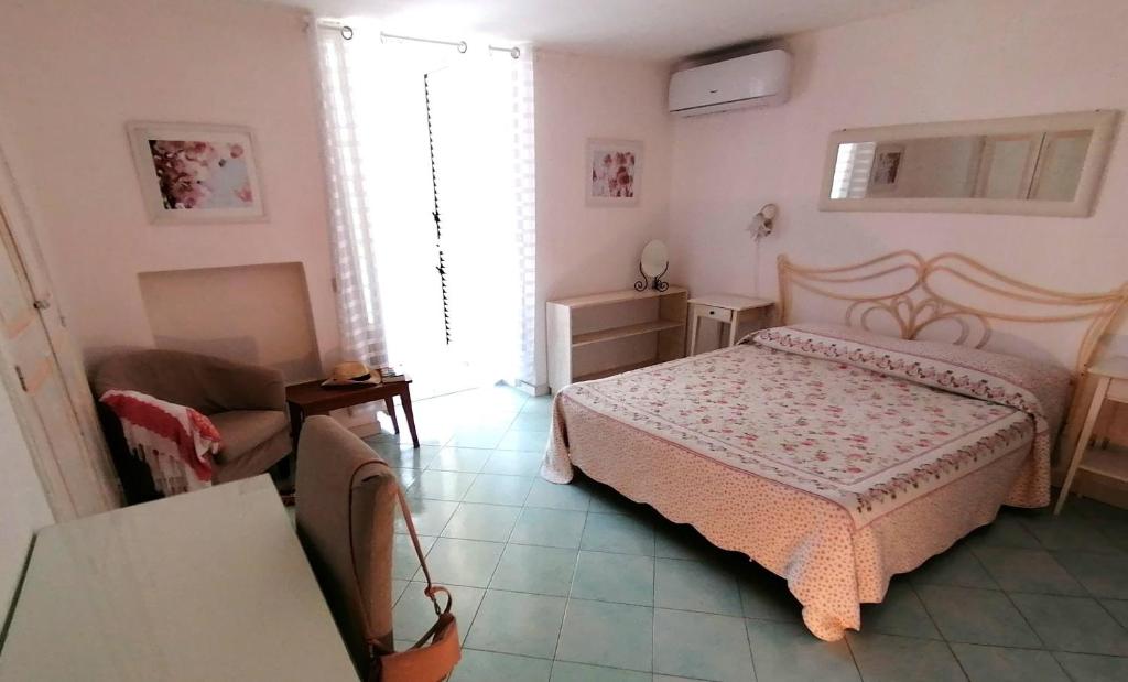 Postel nebo postele na pokoji v ubytování B&B Venus Inn Positano