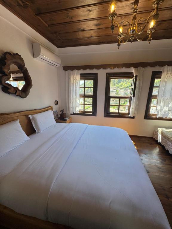 Postel nebo postele na pokoji v ubytování HOTEL ANSEL