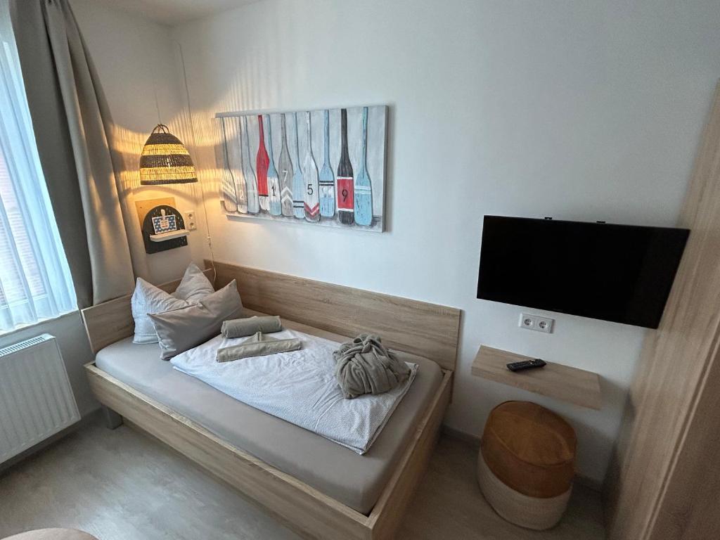 TV a/nebo společenská místnost v ubytování Strandbude Borkum