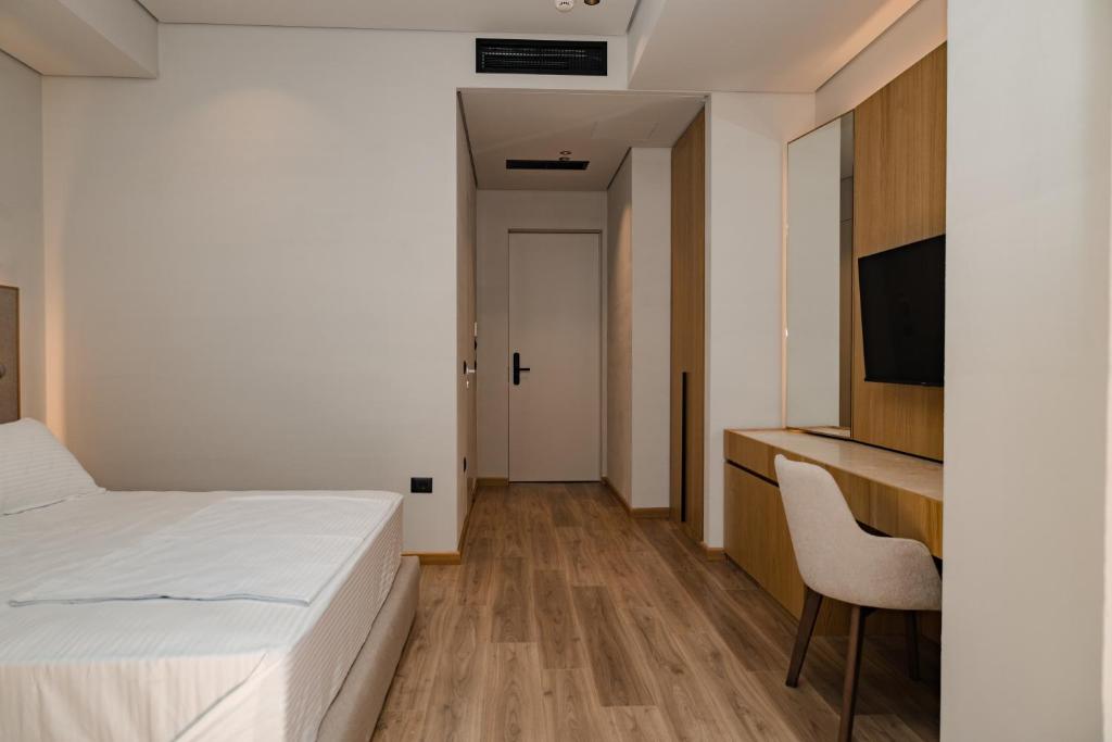 Postel nebo postele na pokoji v ubytování Riviera Blu- Seaside Hotel