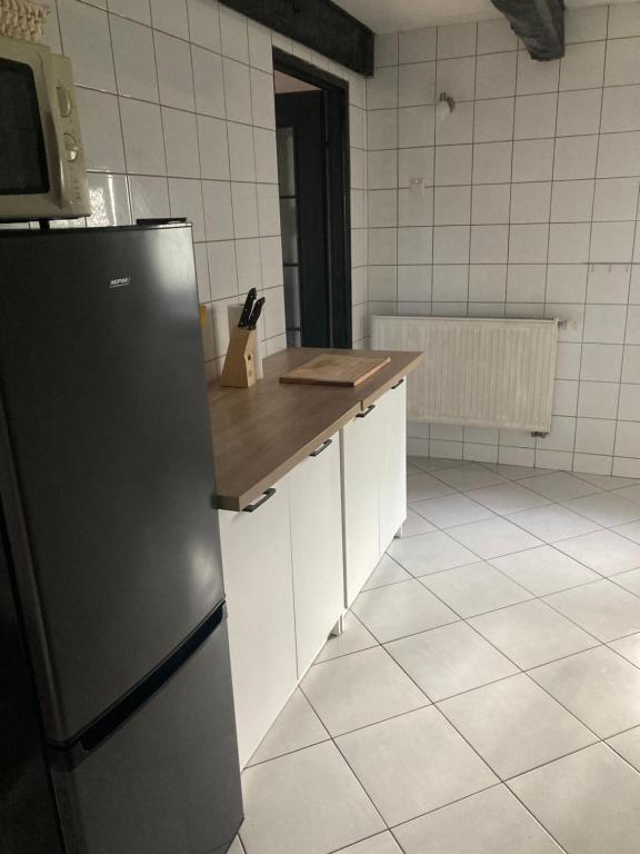 Kuchyňa alebo kuchynka v ubytovaní Agroturystyka Pod Dębami w Klukach