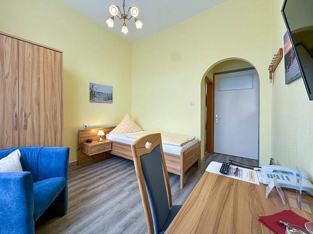 TV a/nebo společenská místnost v ubytování Hotel Graf Waldersee