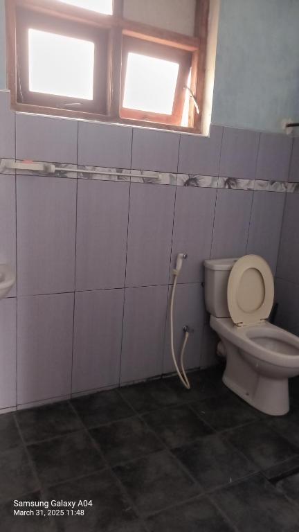 Koupelna v ubytování Siloneeds homes