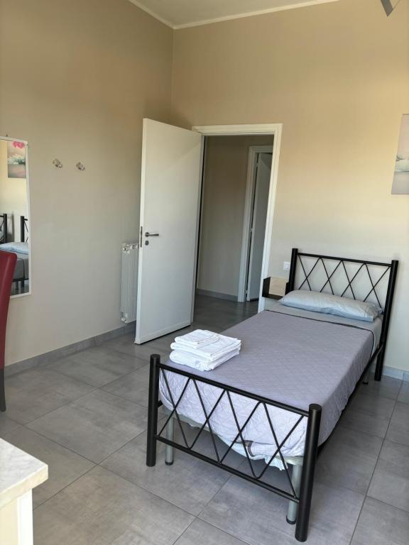 A bed or beds in a room at B&B Alle porte di Caserta