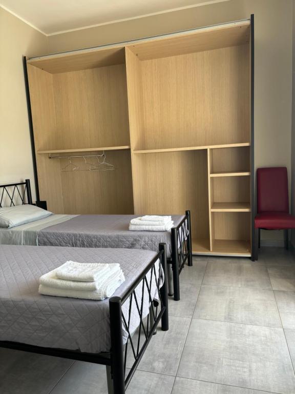 A bed or beds in a room at B&B Alle porte di Caserta