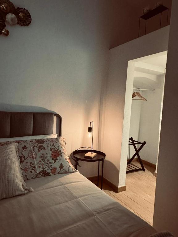 Postel nebo postele na pokoji v ubytování Gaia Home