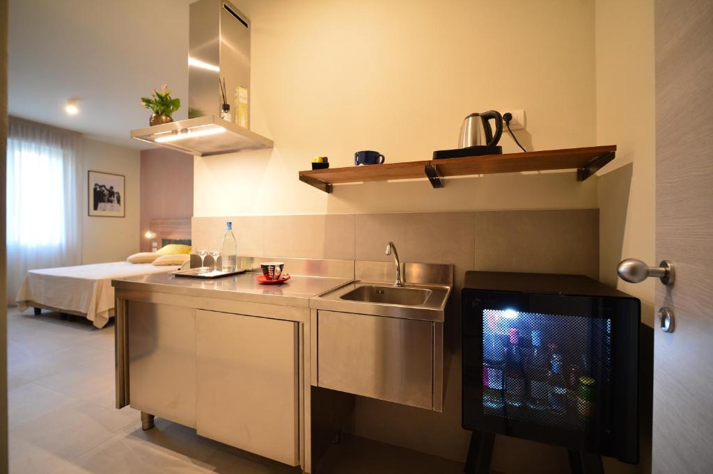 Kuchyň nebo kuchyňský kout v ubytování Locanda Parsifal