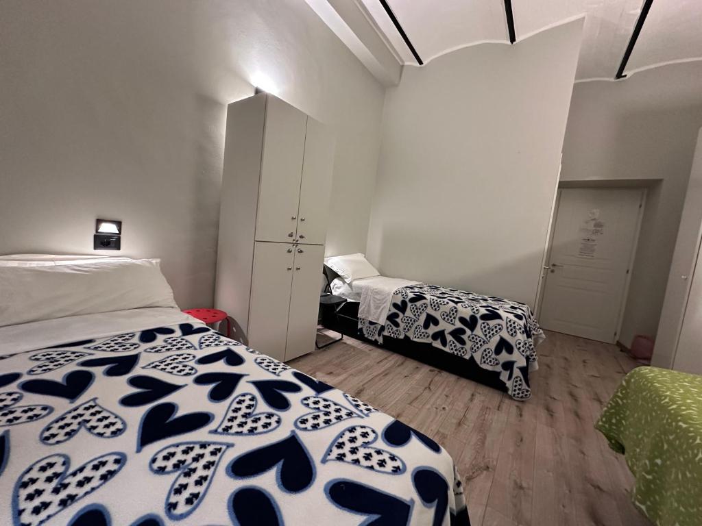 Postel nebo postele na pokoji v ubytování Român Holidays