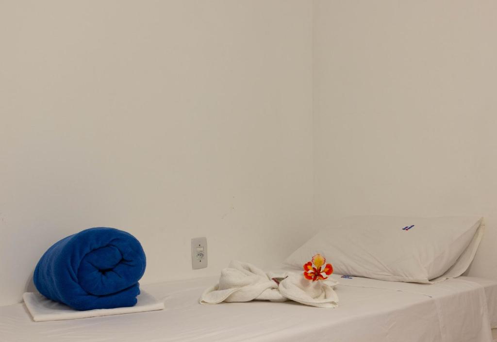 Cama ou camas em um quarto em Hope Pousada