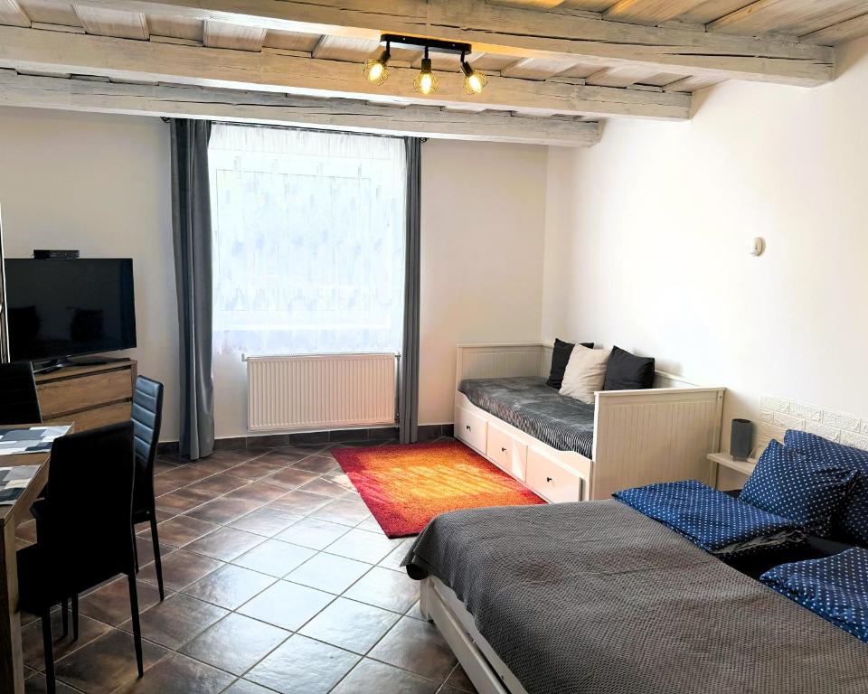 Telewizja i/lub zestaw kina domowego w obiekcie Harmony Vendégház Egerszalók