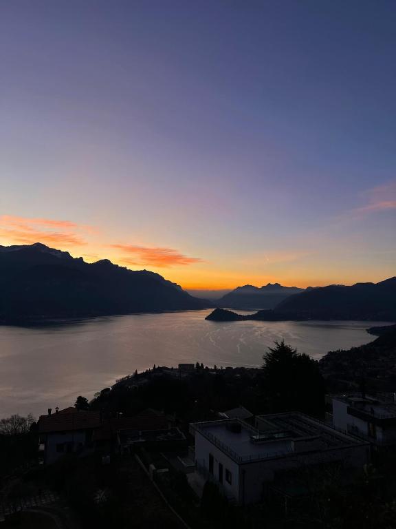 a view of a body of water at sunset at Landscapesilvia Acqua in Menaggio