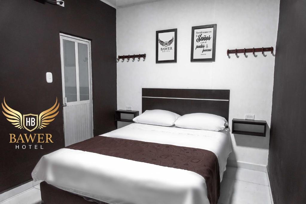 Postel nebo postele na pokoji v ubytování Hotel BAWER