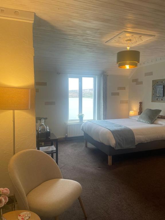 Postel nebo postele na pokoji v ubytování Waterfront Rest B&B