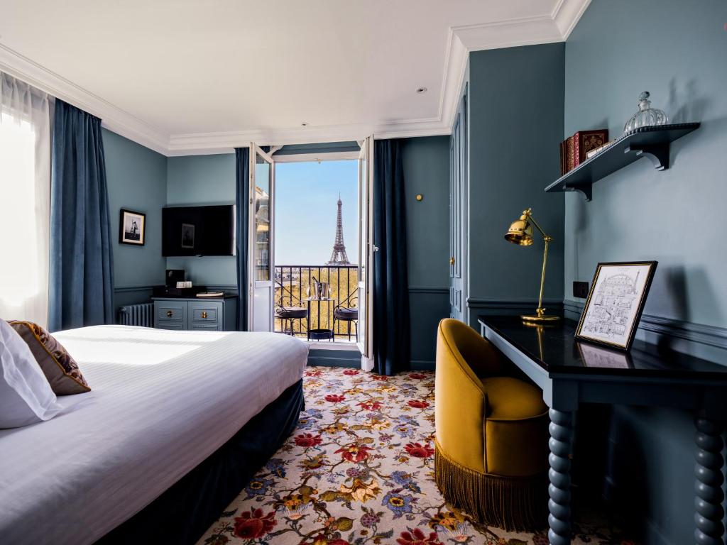 Postel nebo postele na pokoji v ubytování Hotel Duquesne Eiffel