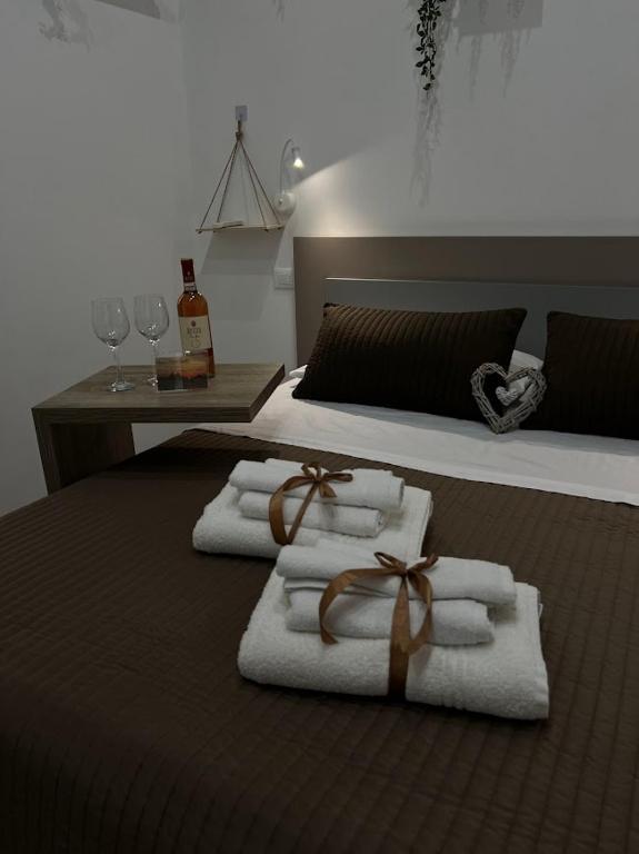 Postel nebo postele na pokoji v ubytování Radici Mare B&B