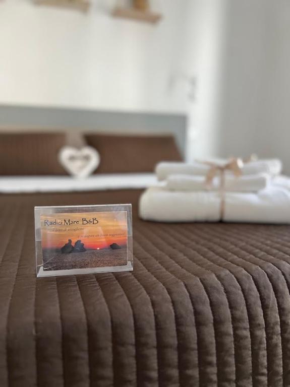 Postel nebo postele na pokoji v ubytování Radici Mare B&B