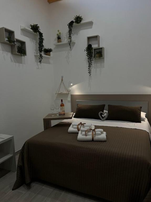 Postel nebo postele na pokoji v ubytování Radici Mare B&B