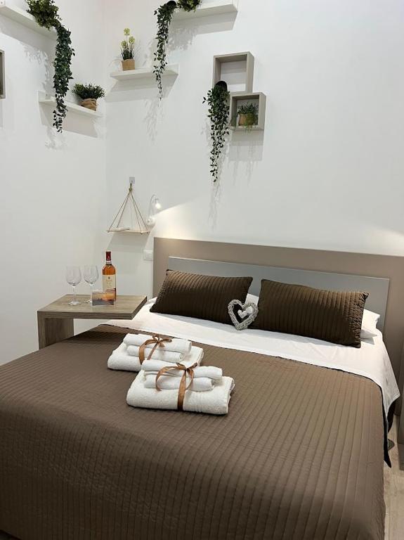 Postel nebo postele na pokoji v ubytování Radici Mare B&B