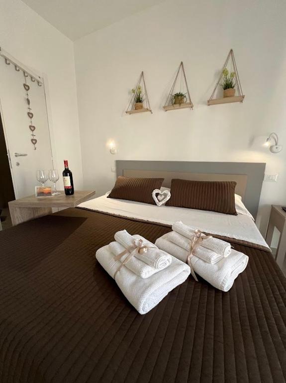 Postel nebo postele na pokoji v ubytování Radici Mare B&B