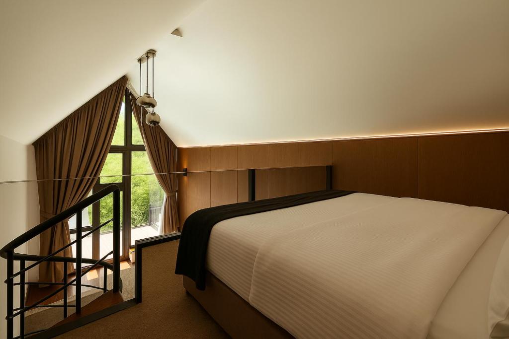 Postel nebo postele na pokoji v ubytování Resort Ujevara e Drinit