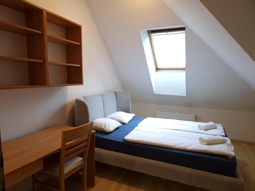 Postel nebo postele na pokoji v ubytování Glinška rooms