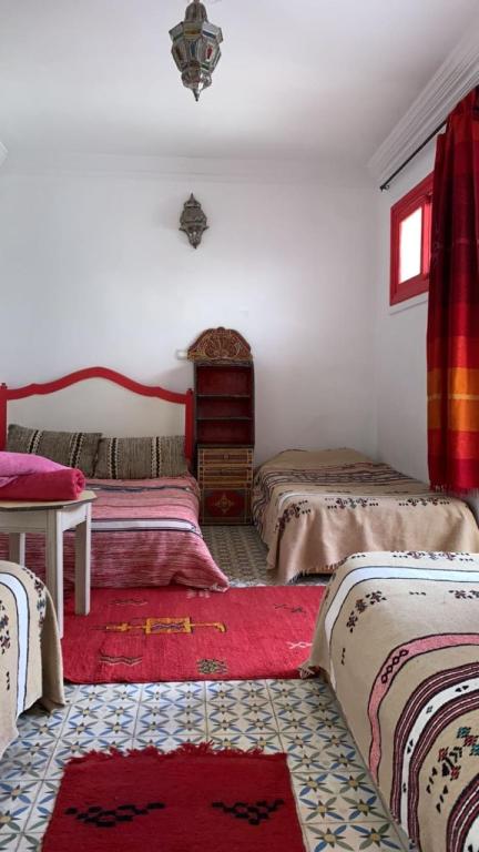 Postel nebo postele na pokoji v ubytování Riad taddert