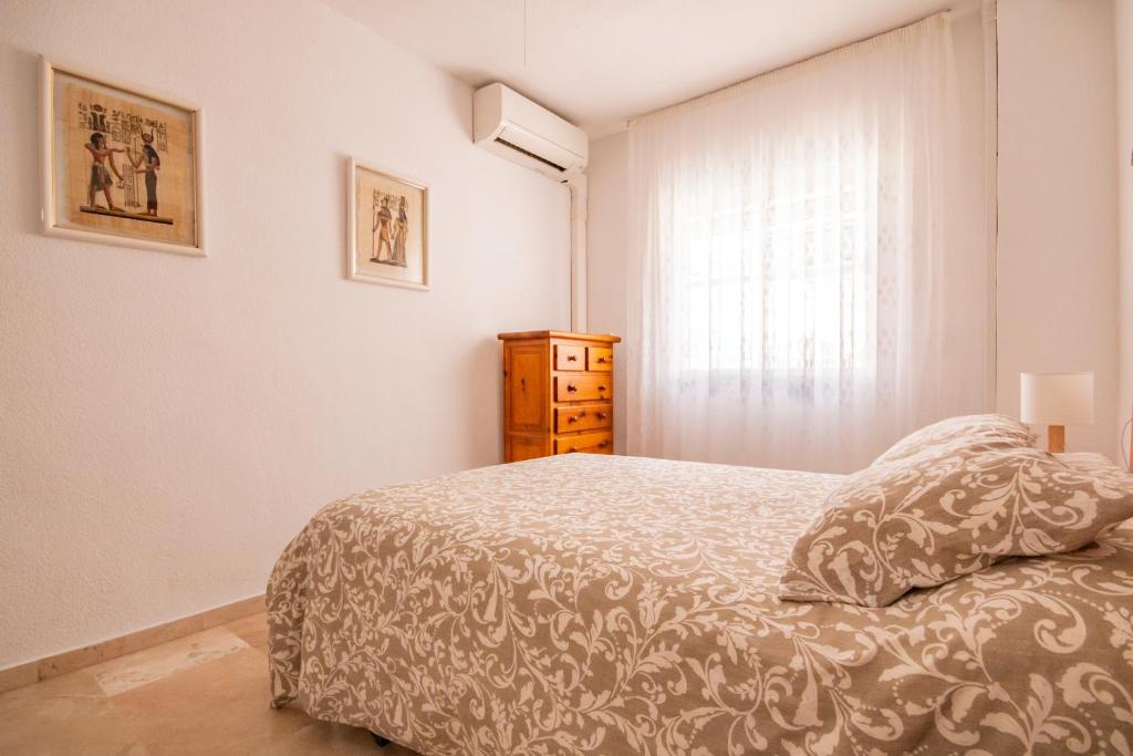 Postel nebo postele na pokoji v ubytování Apartamento Fuentes de Nerja