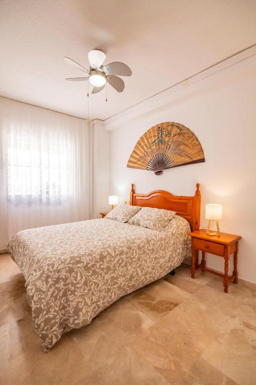 Postel nebo postele na pokoji v ubytování Apartamento Fuentes de Nerja