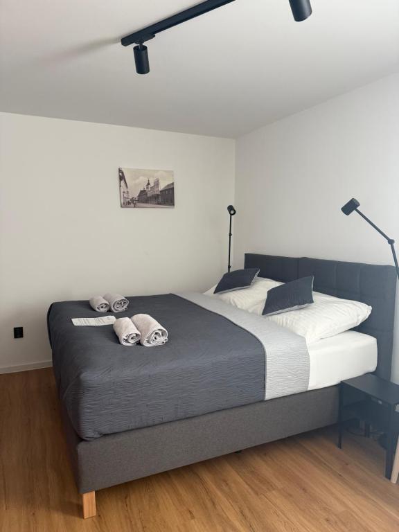 Postel nebo postele na pokoji v ubytování Hotel Grand