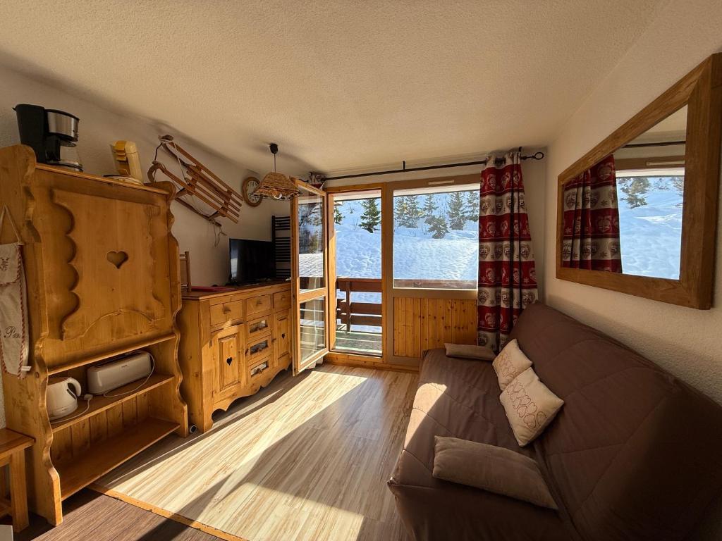 Televisyen dan/atau pusat hiburan di Appart 4personnes - Pied des pistes - Sud - Mottaret