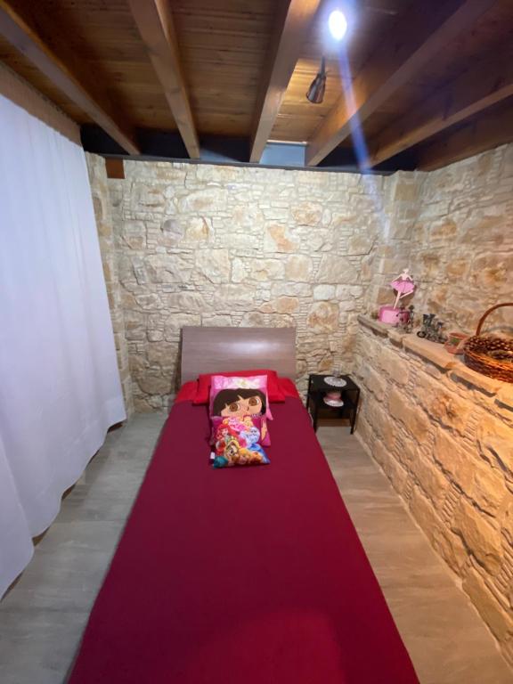 Postel nebo postele na pokoji v ubytování Lofitiko