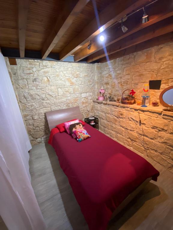 Postel nebo postele na pokoji v ubytování Lofitiko