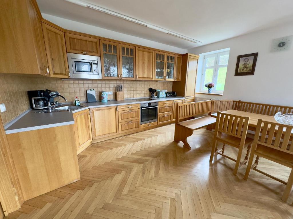 Kuchyň nebo kuchyňský kout v ubytování Chata Moni