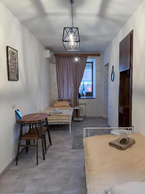 Postel nebo postele na pokoji v ubytování Caribian Hotel Yerevan
