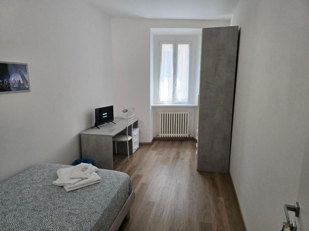 Postel nebo postele na pokoji v ubytování DA NI TO Rooms 4