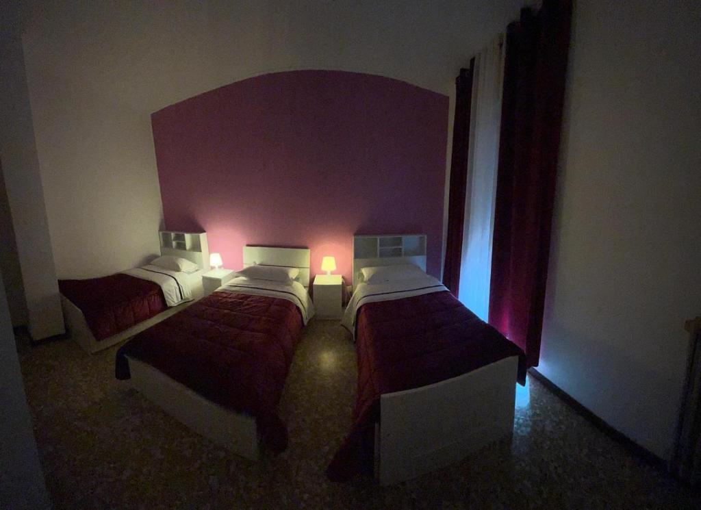 Postel nebo postele na pokoji v ubytování Aeroporto room