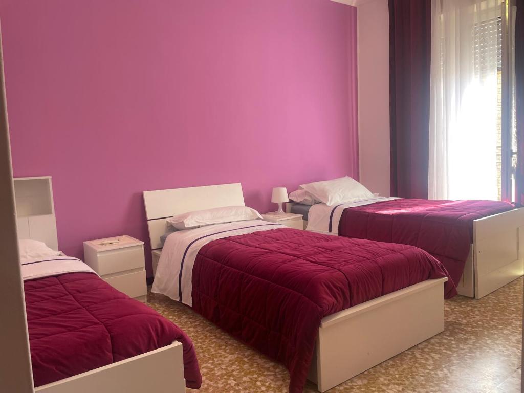 Postel nebo postele na pokoji v ubytování Aeroporto room