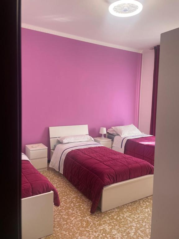 Postel nebo postele na pokoji v ubytování Aeroporto room
