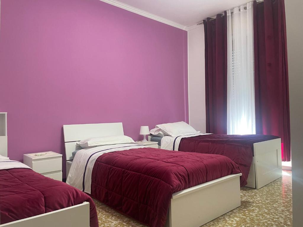 Postel nebo postele na pokoji v ubytování Aeroporto room