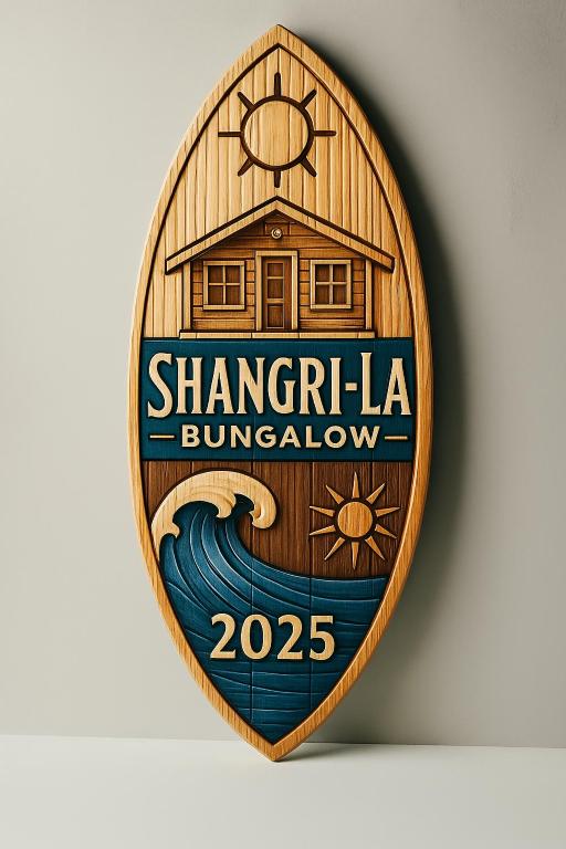 a wooden sign with a shangri la building at Бунгало Шангри Ла - 1, плаж Градина in Sozopol