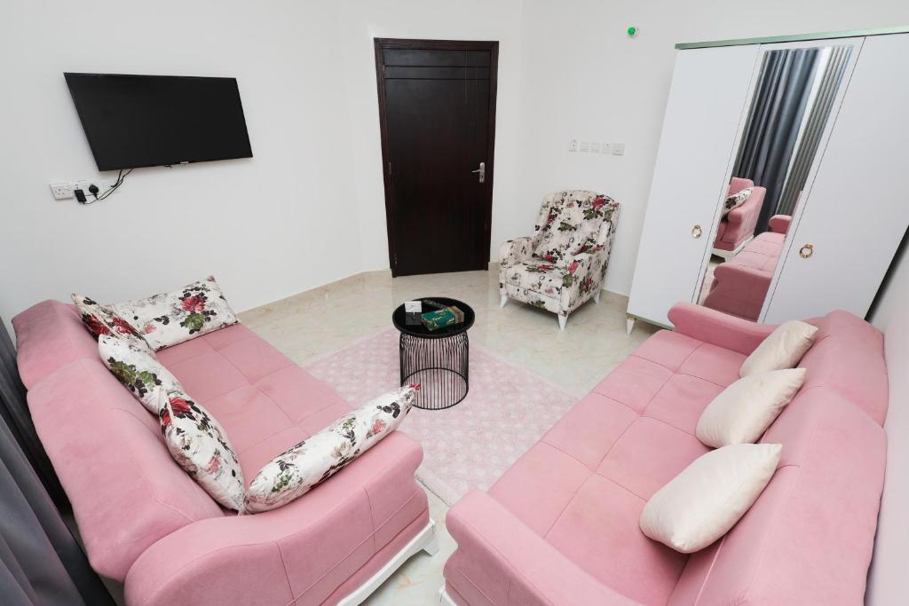 TV a/nebo společenská místnost v ubytování نسائم صلاله للشقق الفاخرة Nassayem Salalah Downtown