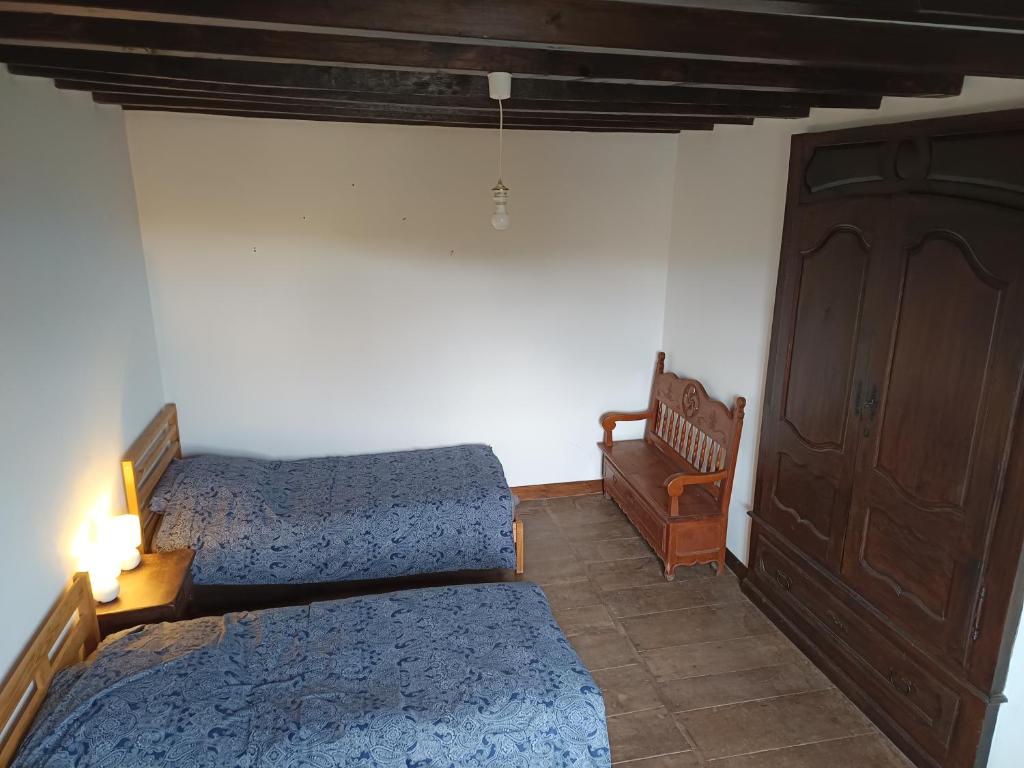 Postel nebo postele na pokoji v ubytování Ithurbidia