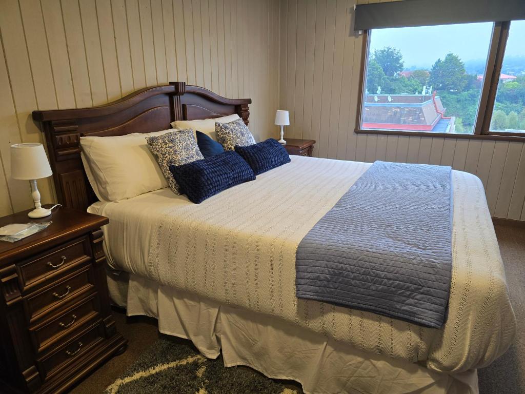 Postel nebo postele na pokoji v ubytování Santa Rosa Hotel boutique