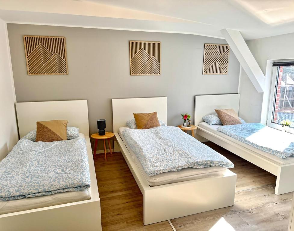 En eller flere senge i et værelse på Studio Apartment 3 - Komfort & Günstig