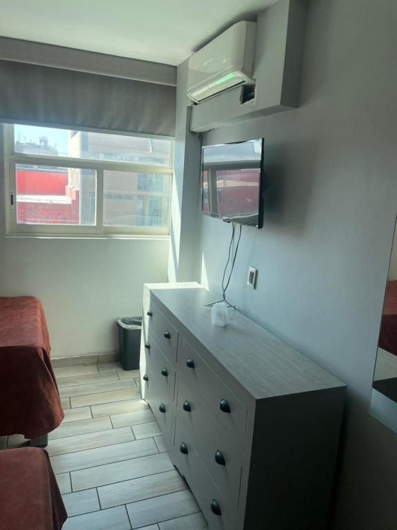Kuchyň nebo kuchyňský kout v ubytování Hotel Colon Express