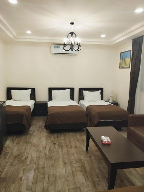 Postel nebo postele na pokoji v ubytování Boutique Living Hotel