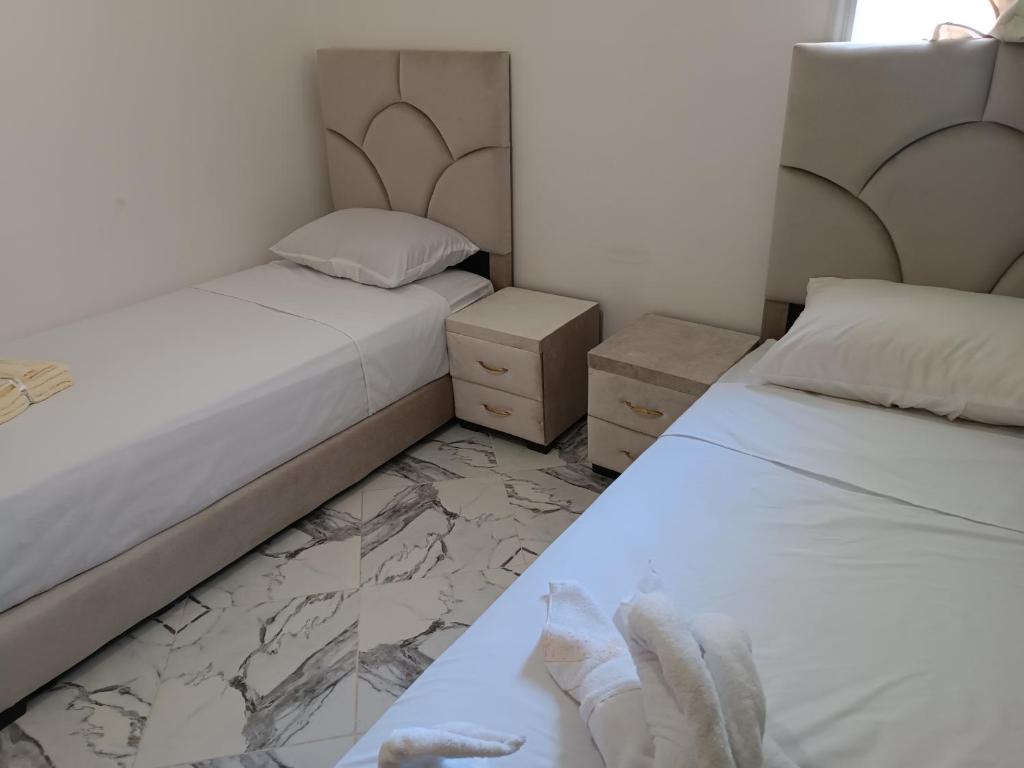 Postel nebo postele na pokoji v ubytování Azur Luxury View - Panoramic Apartment in Fes
